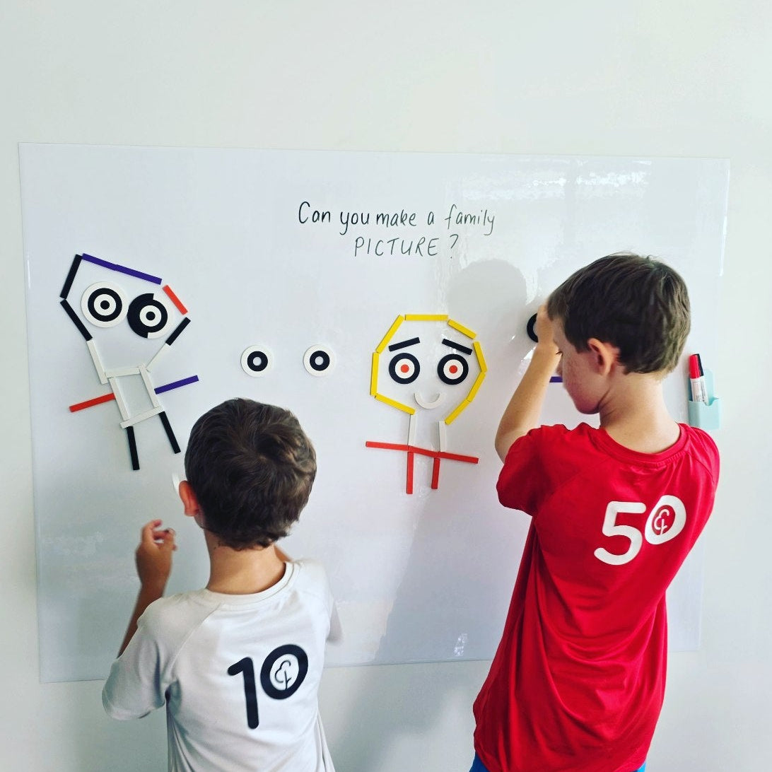 Magnetic whiteboard wall decal for dry-erase markers and magnetic tiles