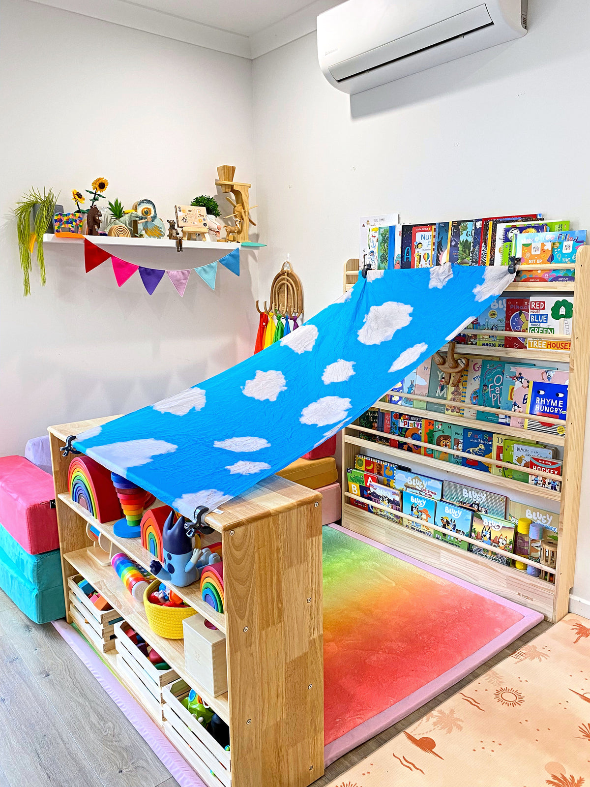 Open-front Montessori toy and book storage shelf with low child-height access