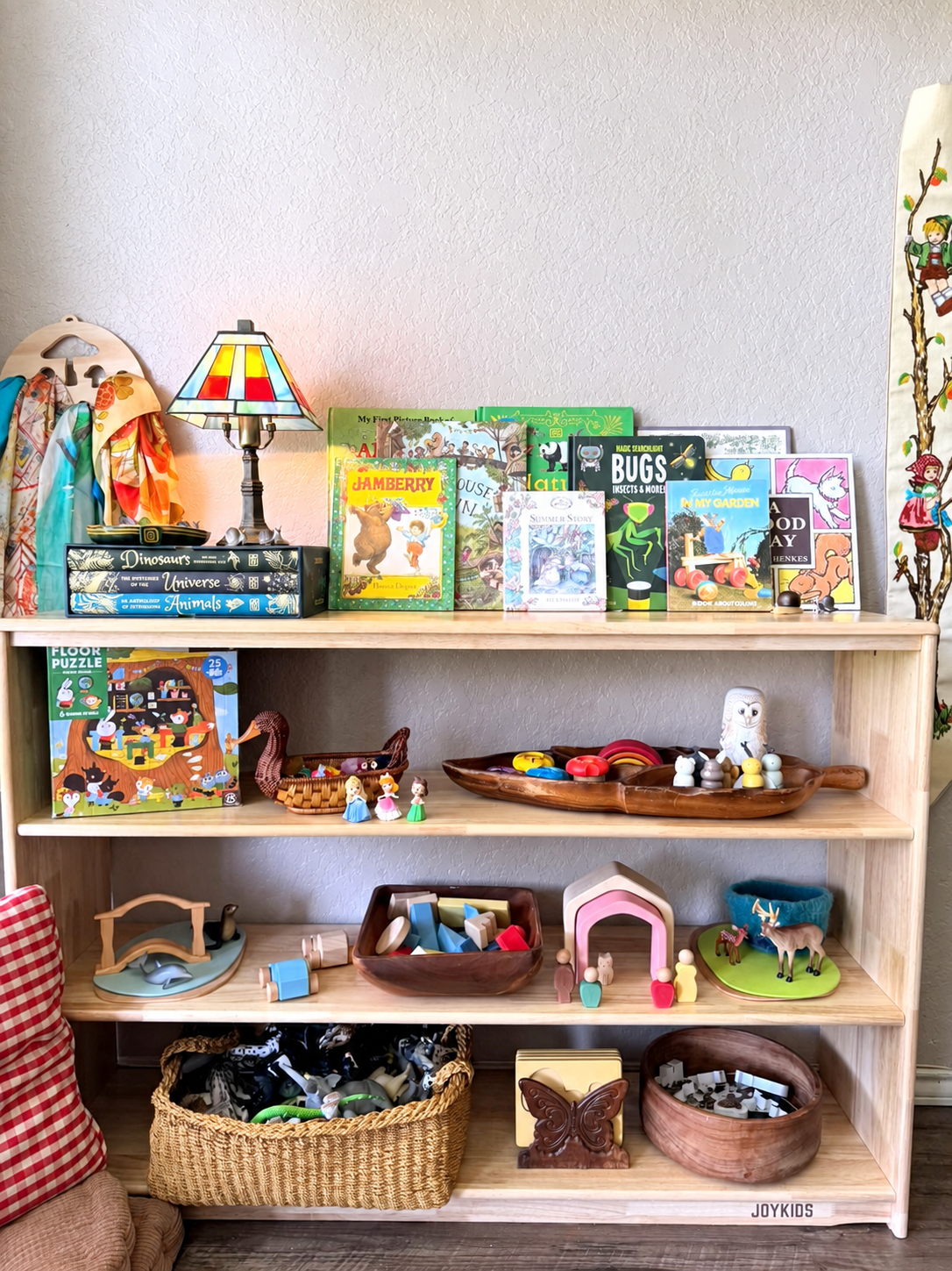 JORA 4 open-ended toy shelf styled with books, wooden toys and woven baskets