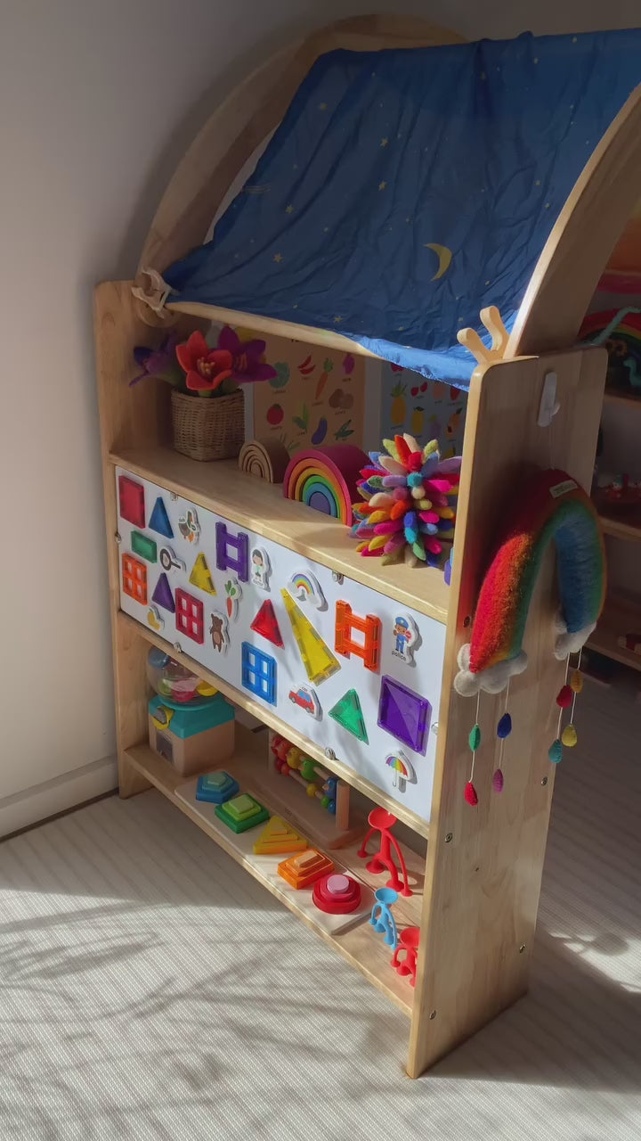 A customer walks through the JoyNOOK playstand and its magnetic and acrylic boards