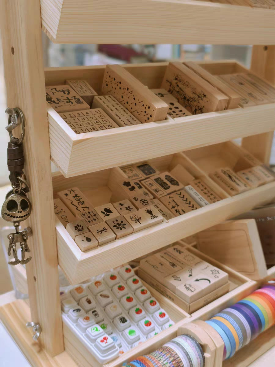 Convertible wooden organiser with adjustable slot sizes and tilt for display